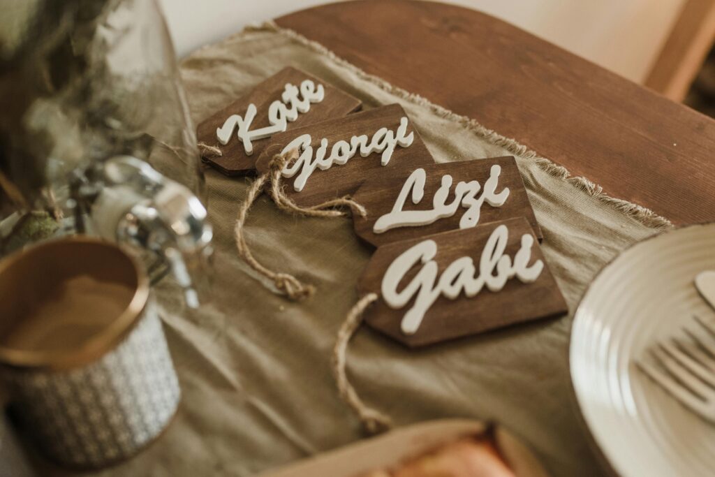 Elegant dining table setup with personalized wooden name tags adding a warm touch to any special occasion.